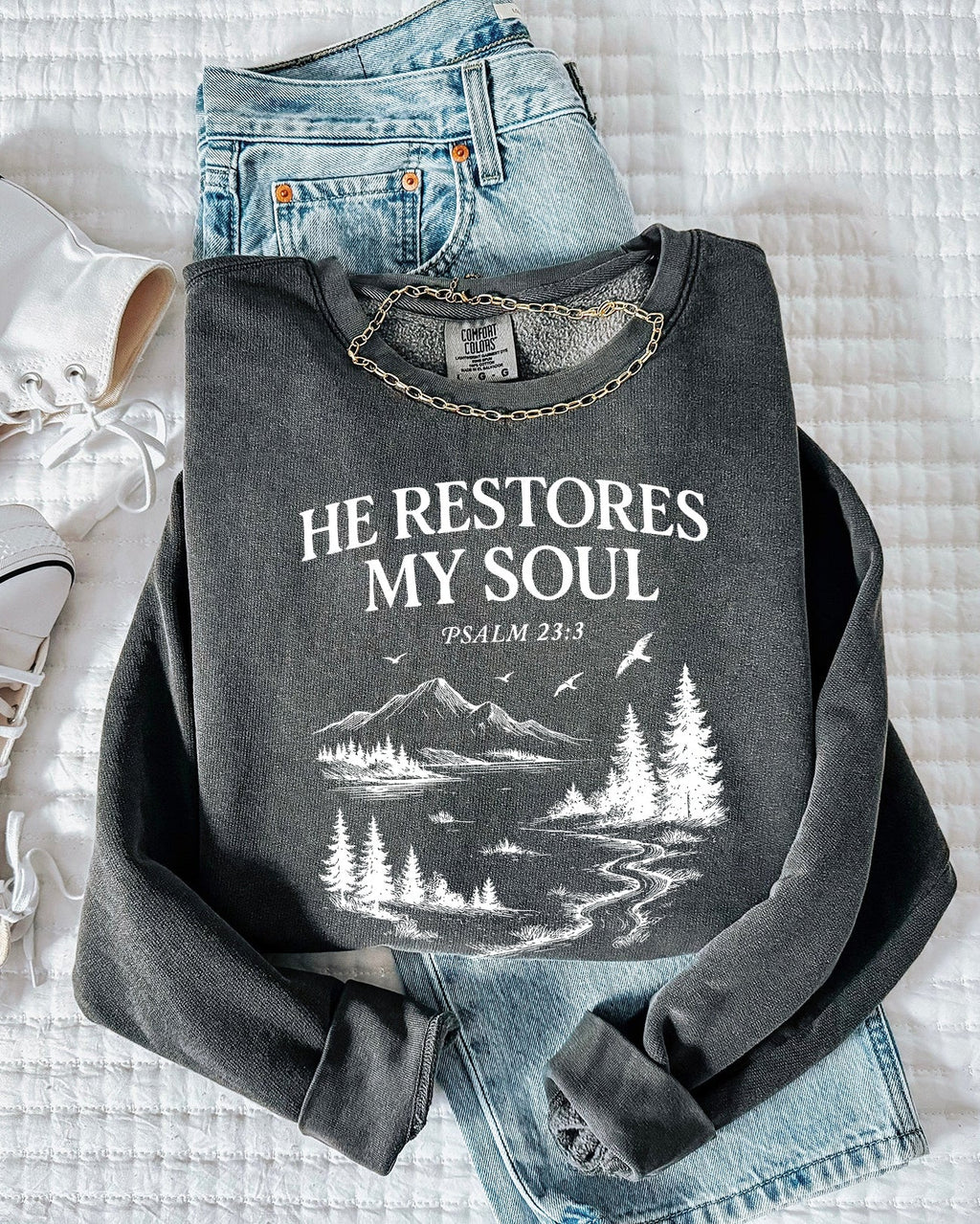 Dyed pepper black sweatshirt with “He Restores My Soul” Psalm 23:3 forest graphic