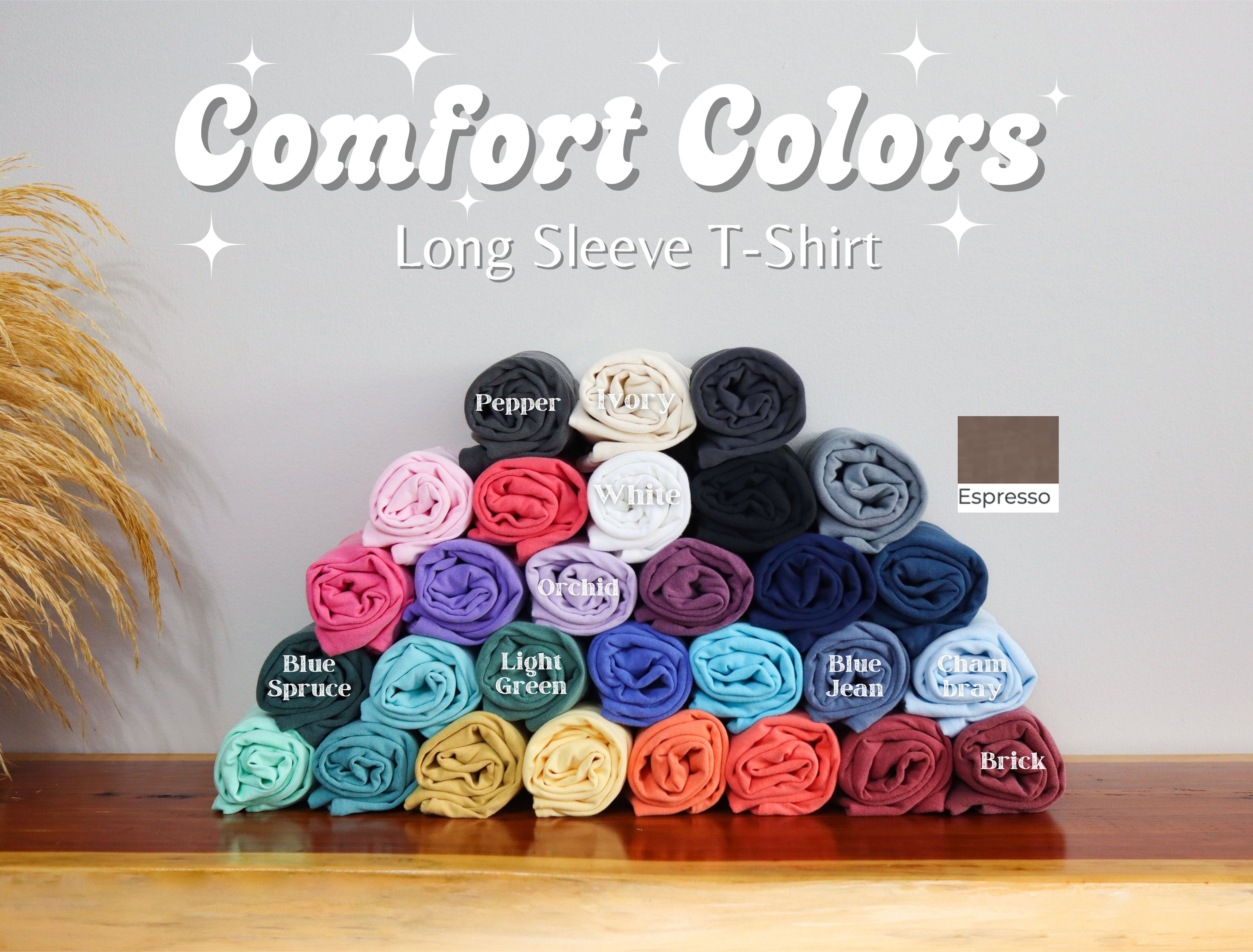 Comfort Colors long sleeve T-shirt color chart with folded shirts in multiple shades