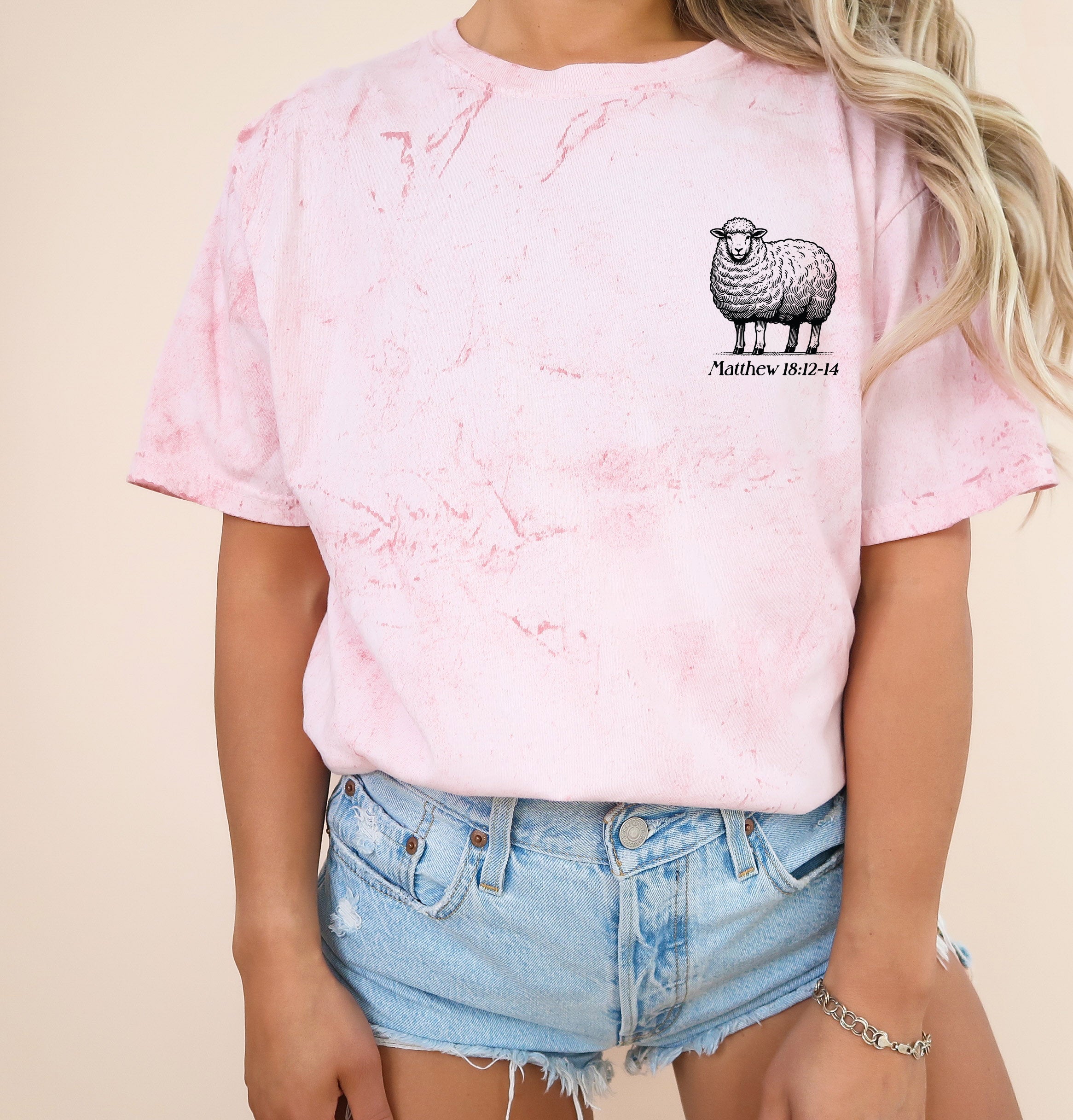 Pink garment-dyed T-shirt with sheep graphic on chest