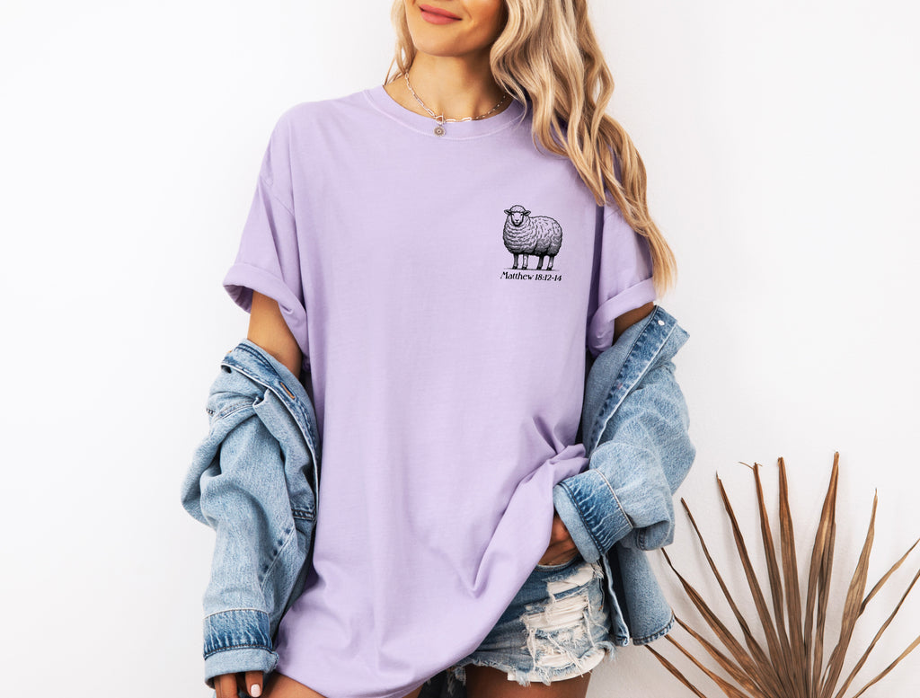 Purple garment-dyed T-shirt with sheep graphic on chest
