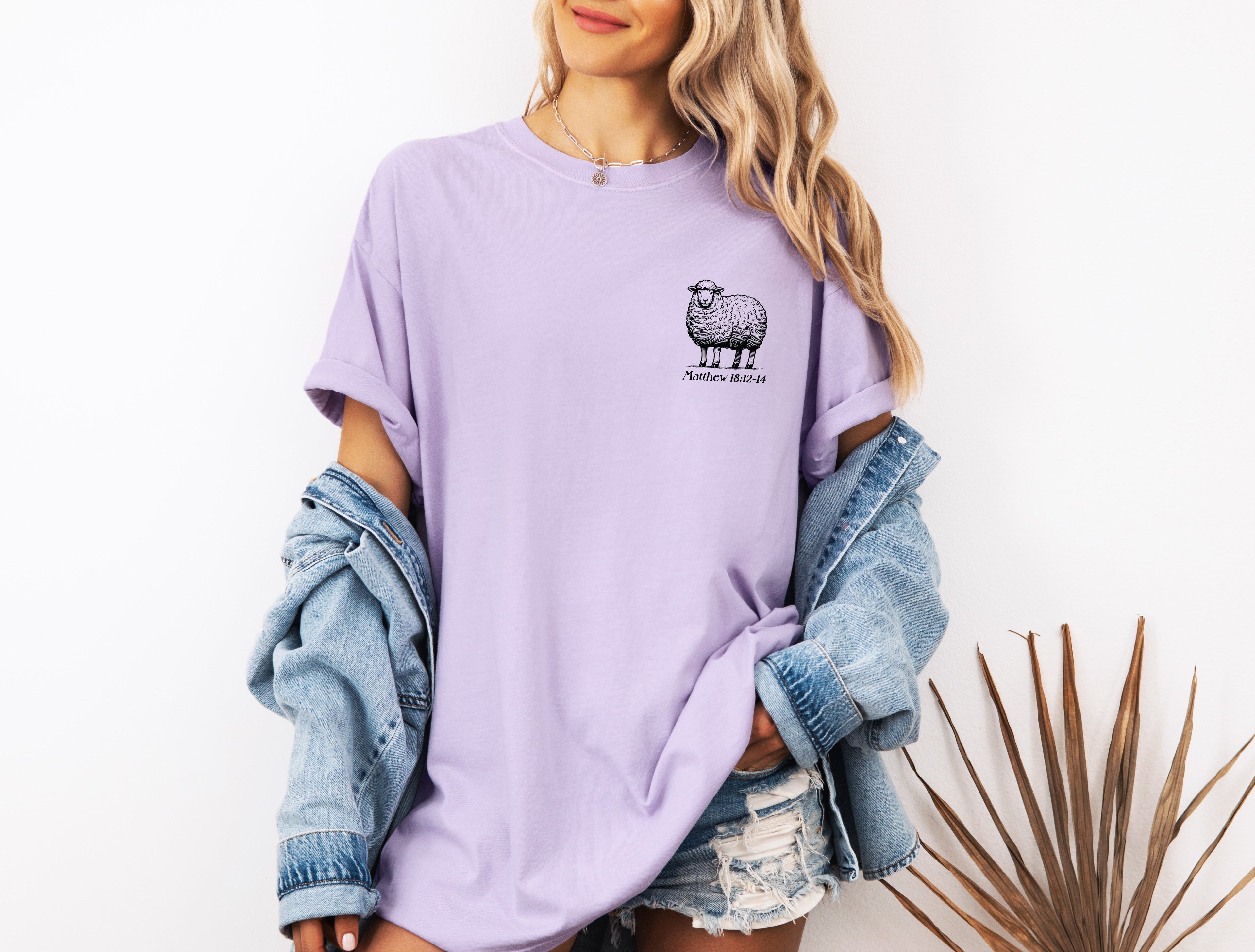 Purple garment-dyed T-shirt with sheep graphic on chest