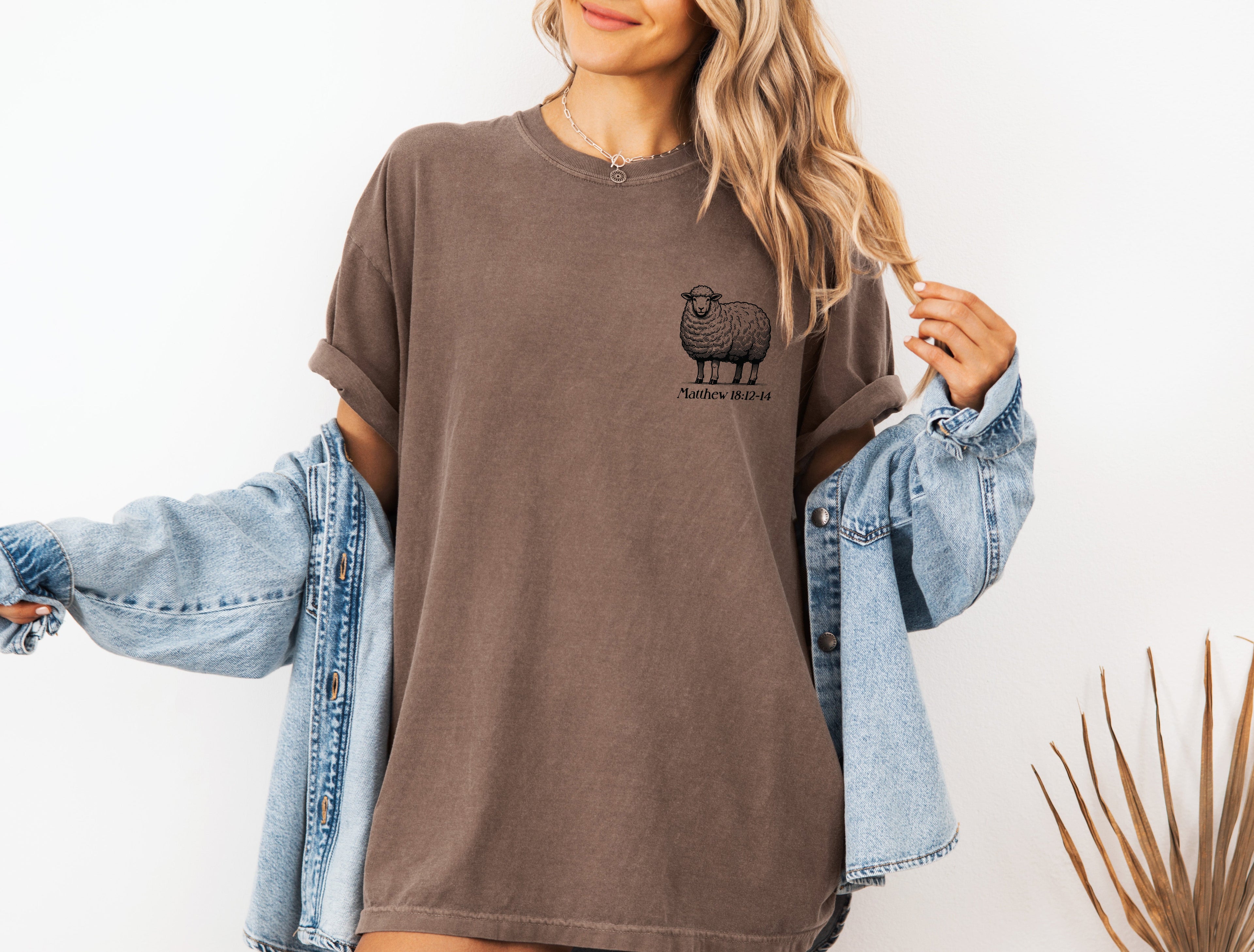 Brown garment-dyed T-shirt with sheep graphic on chest