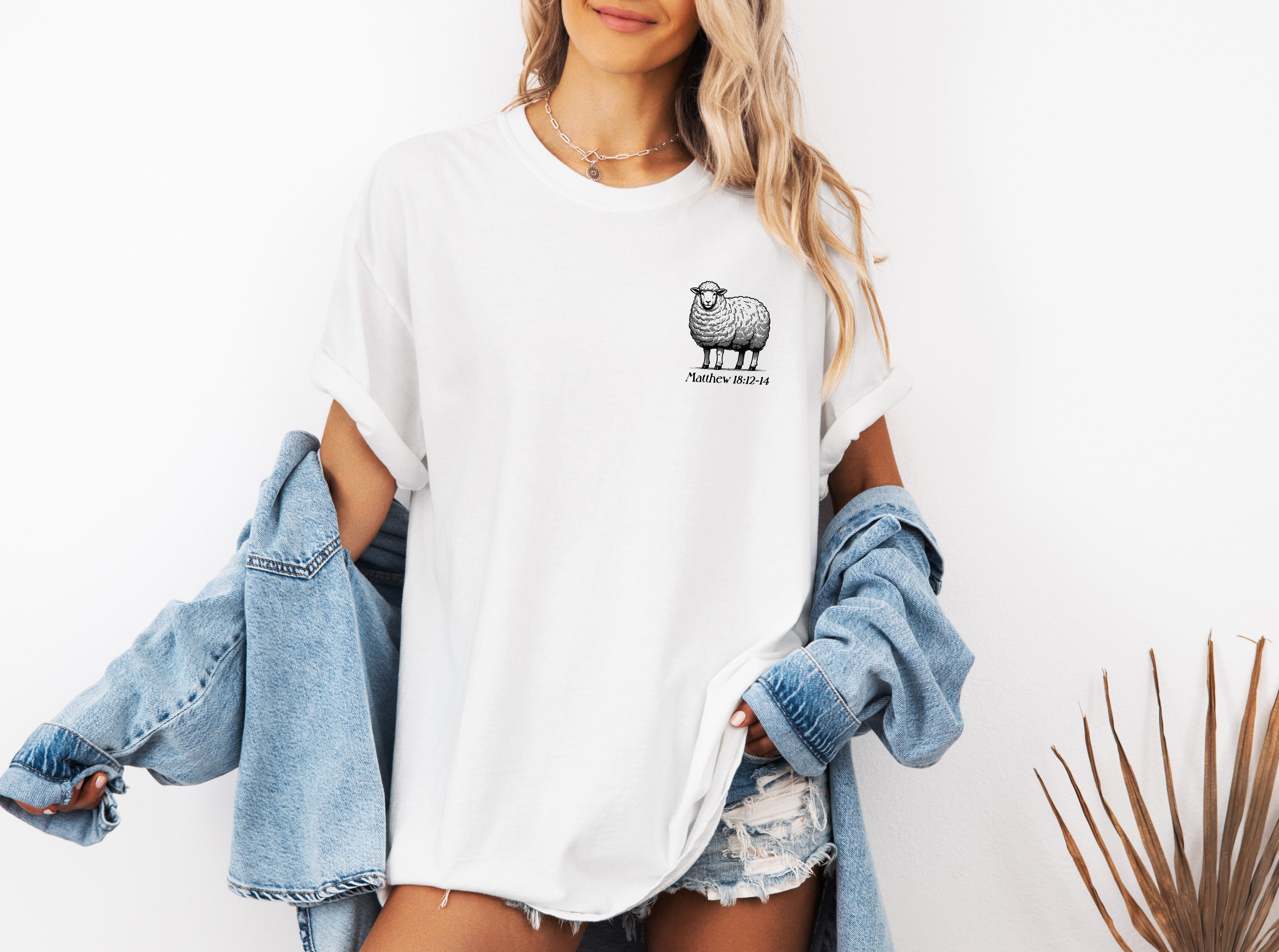 White unisex graphic T-shirt with small chest sheep logo