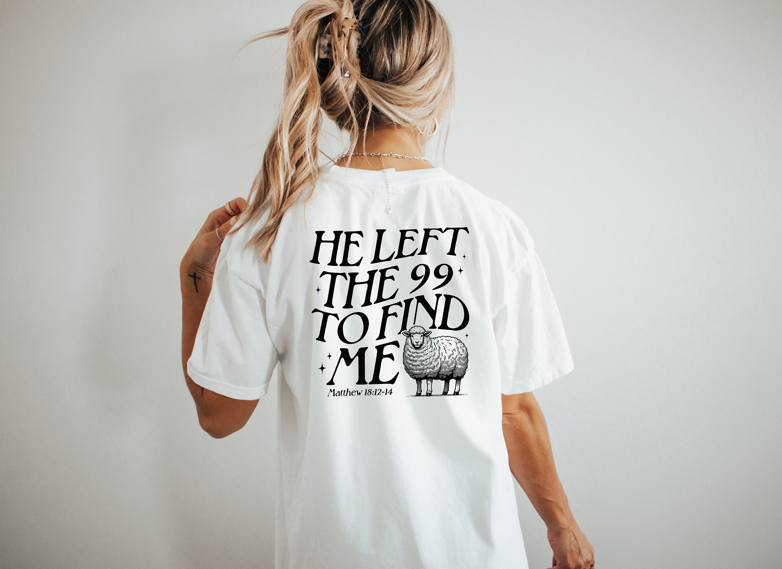 White unisex graphic T-shirt with sheep logo text on back