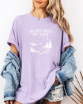 Lavender Christian graphic T-shirt with 'He restores my soul' mountain and tree print
