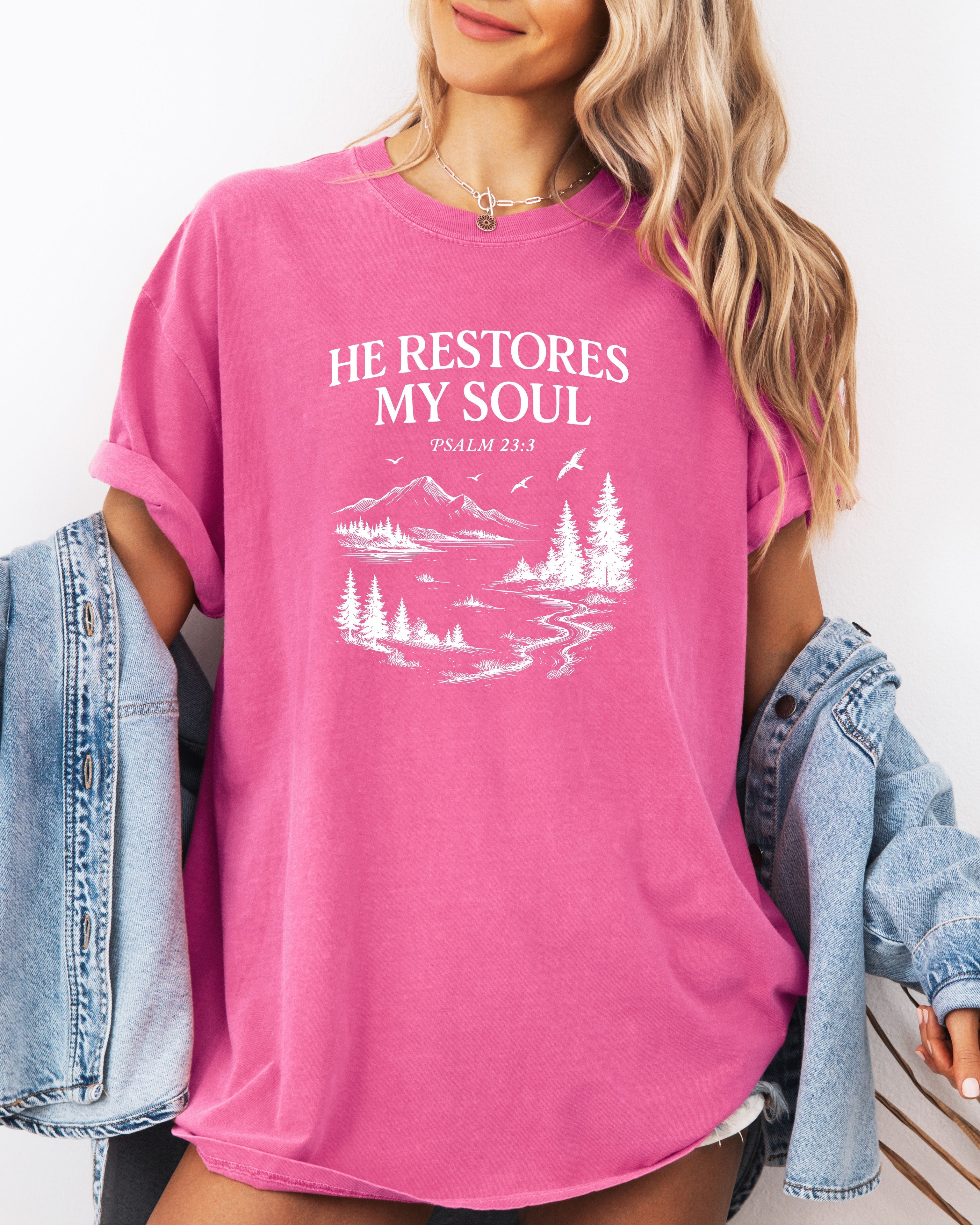 Orchid Christian graphic T-shirt with 'He restores my soul' mountain and tree print