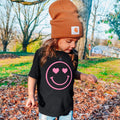 Black baby girl t-shirt with pink heart-eyed smiley face graphic