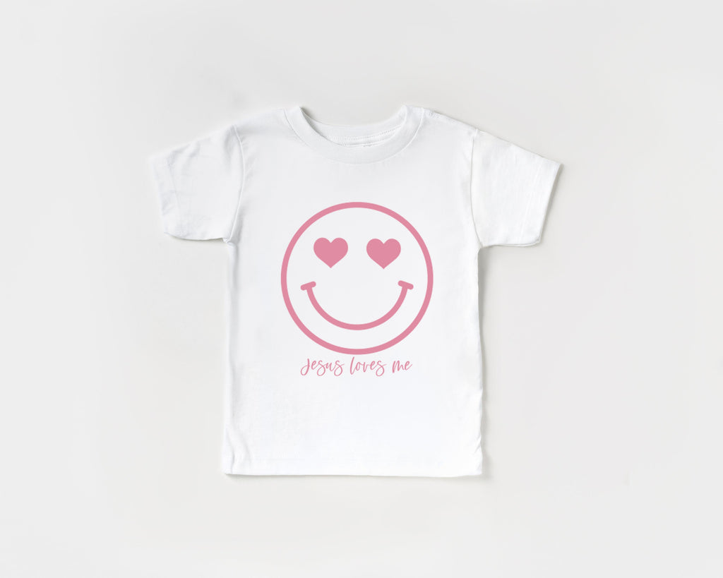 White baby & kids organic cotton tee with pink heart smile graphic