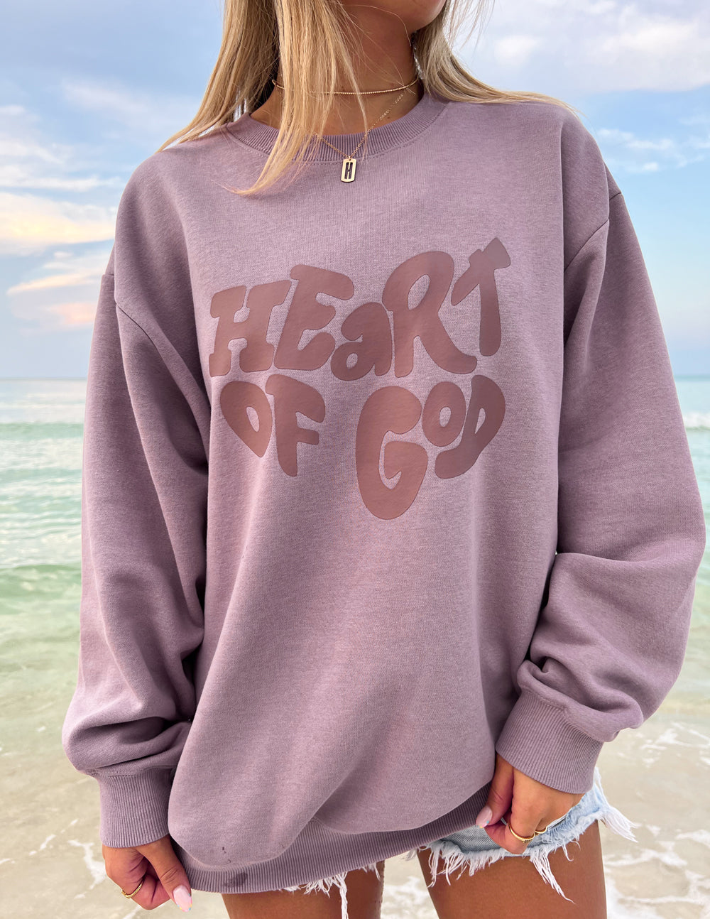 Mauve unisex crewneck sweatshirt with Heart of God front graphic