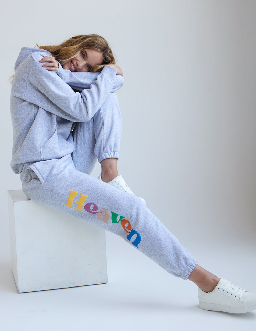 Heather grey unisex sweatpants with multicolor 'Heaven' logo on side of leg