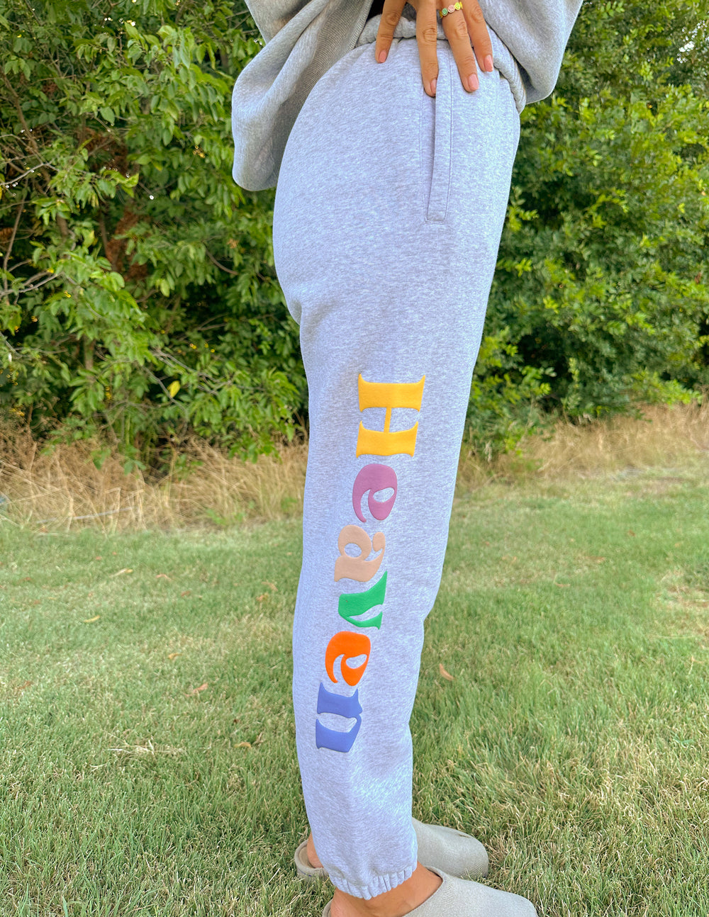 Heather grey sweatpants with multicolor 'Heaven' logo vertical print