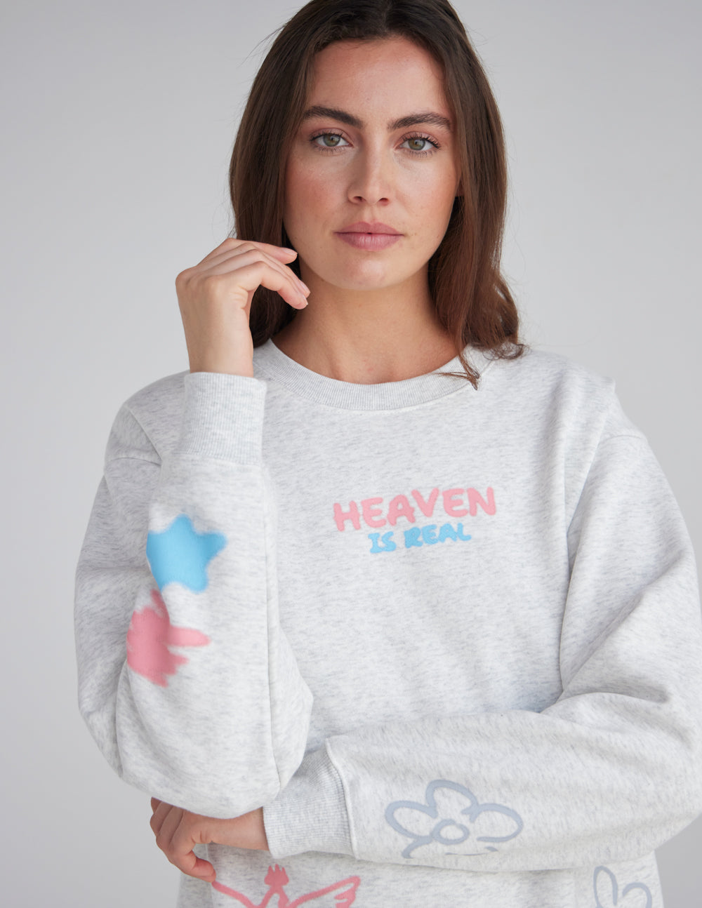 Unisex crewneck sweatshirt in heather gray with colorful cloud and star graphics