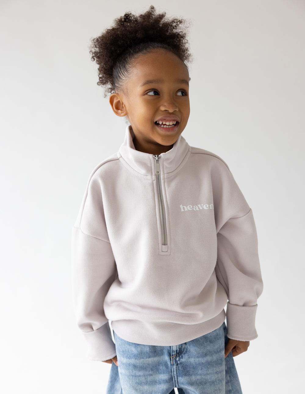 Kids half-zip sweatshirt in light mauve with zipper placket and chest logo