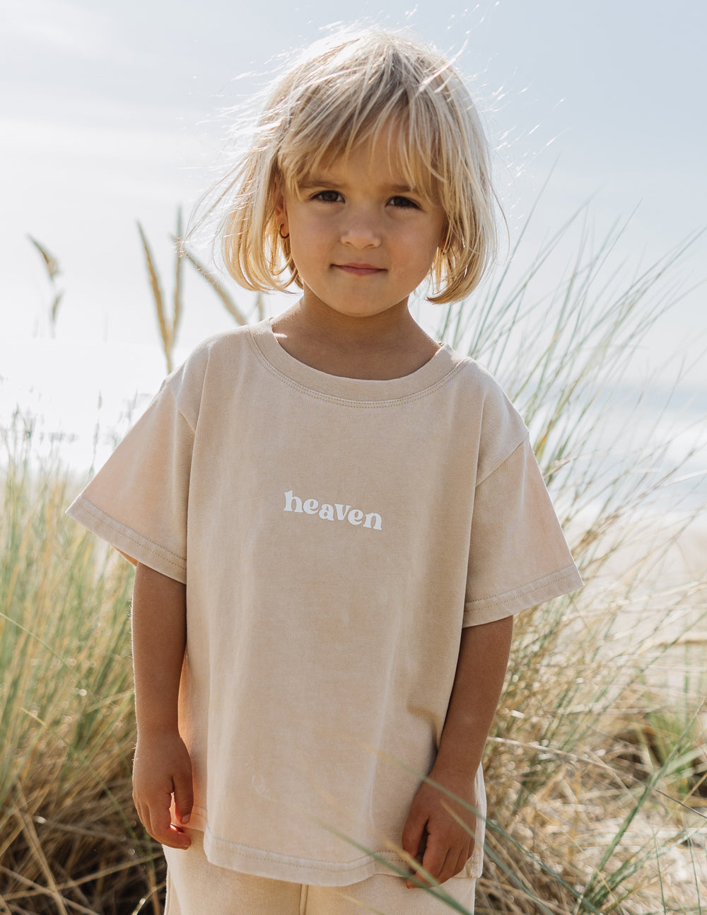 Kids tan T-shirt with small chest 'heaven' logo print, crew neck, short sleeves
