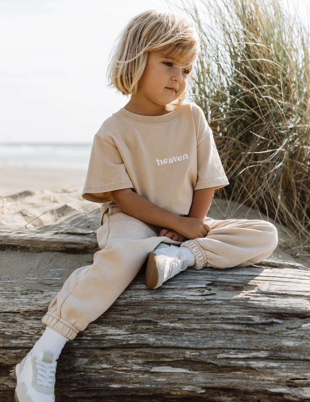Kids tan T-shirt with 'heaven' chest logo print, crew neck, short sleeves