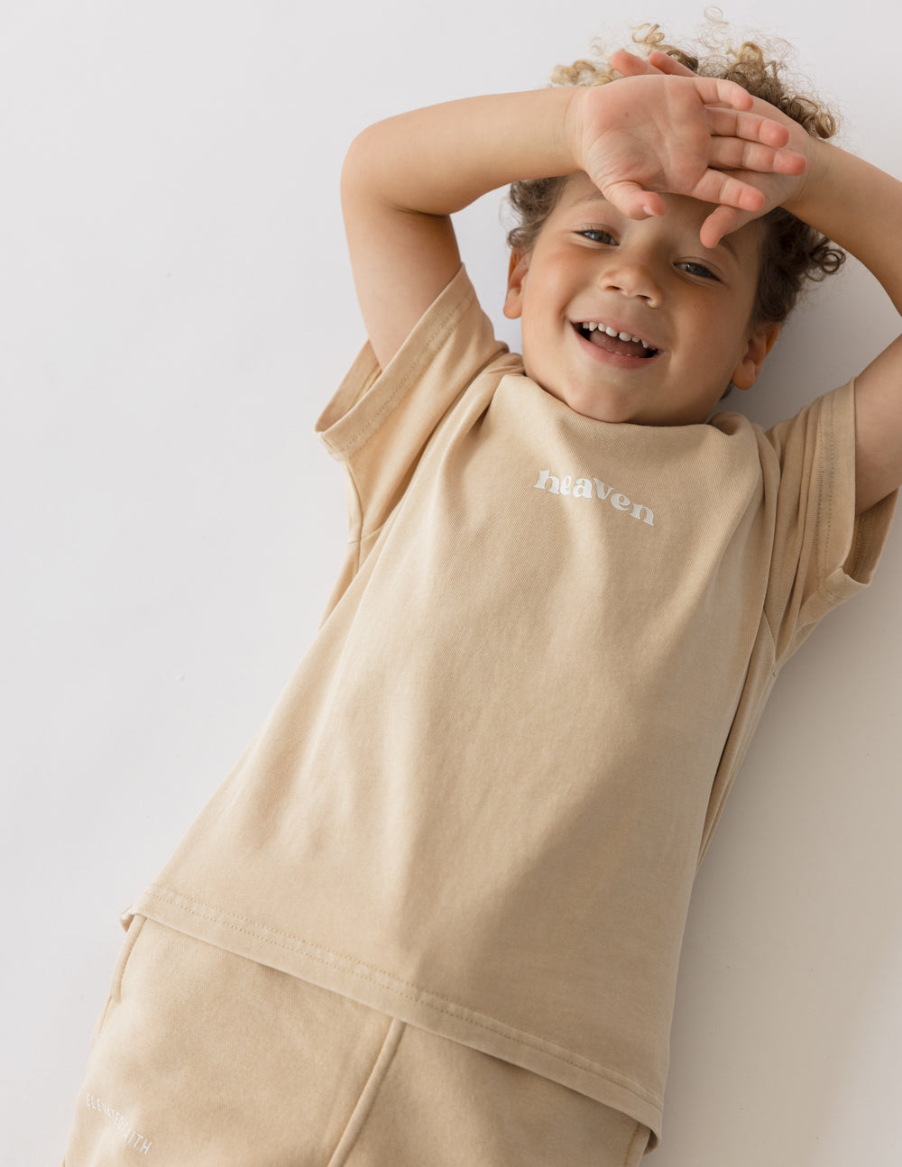 Kids tan T-shirt with 'heaven' logo print on the chest, crew neck, short sleeves