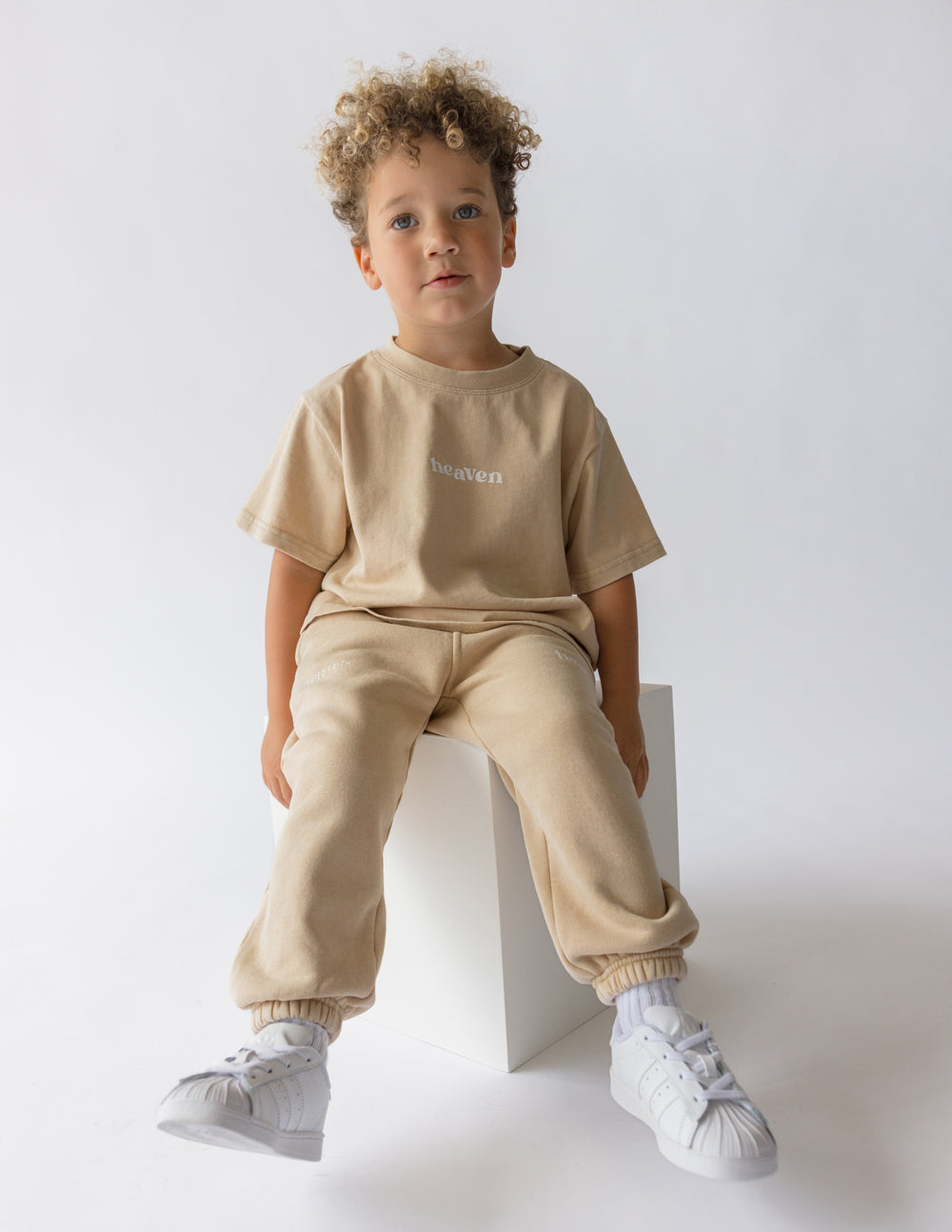 Kids tan T-shirt with 'heaven' chest logo print, crew neck, short sleeves