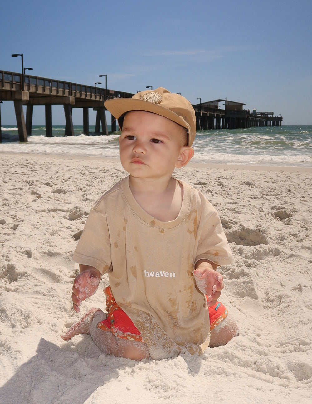 Kids tan T-shirt with 'heaven' logo print on the chest, crew neck, short sleeves