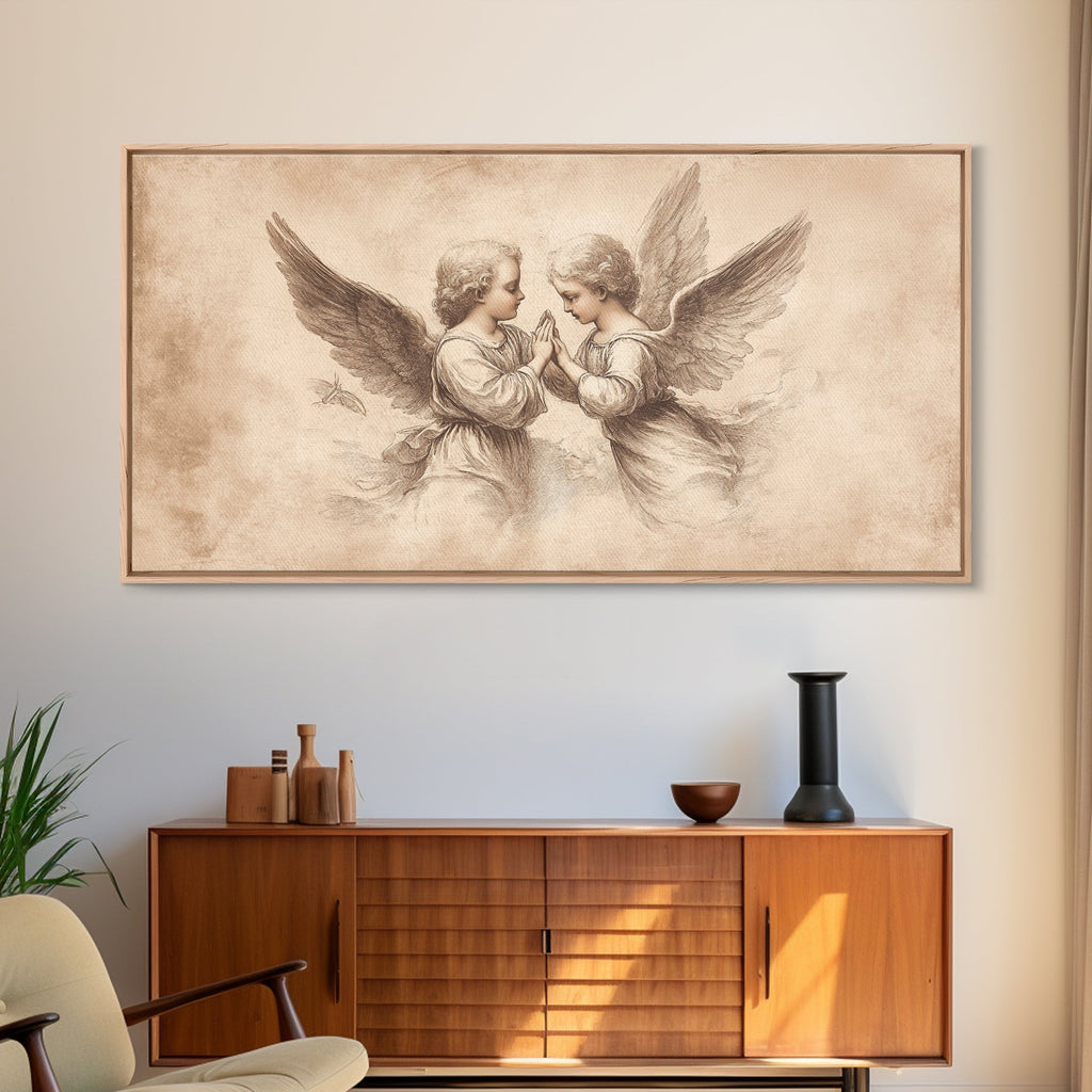 Framed angel wall art canvas print with two cherubs and wings, in warm wood border