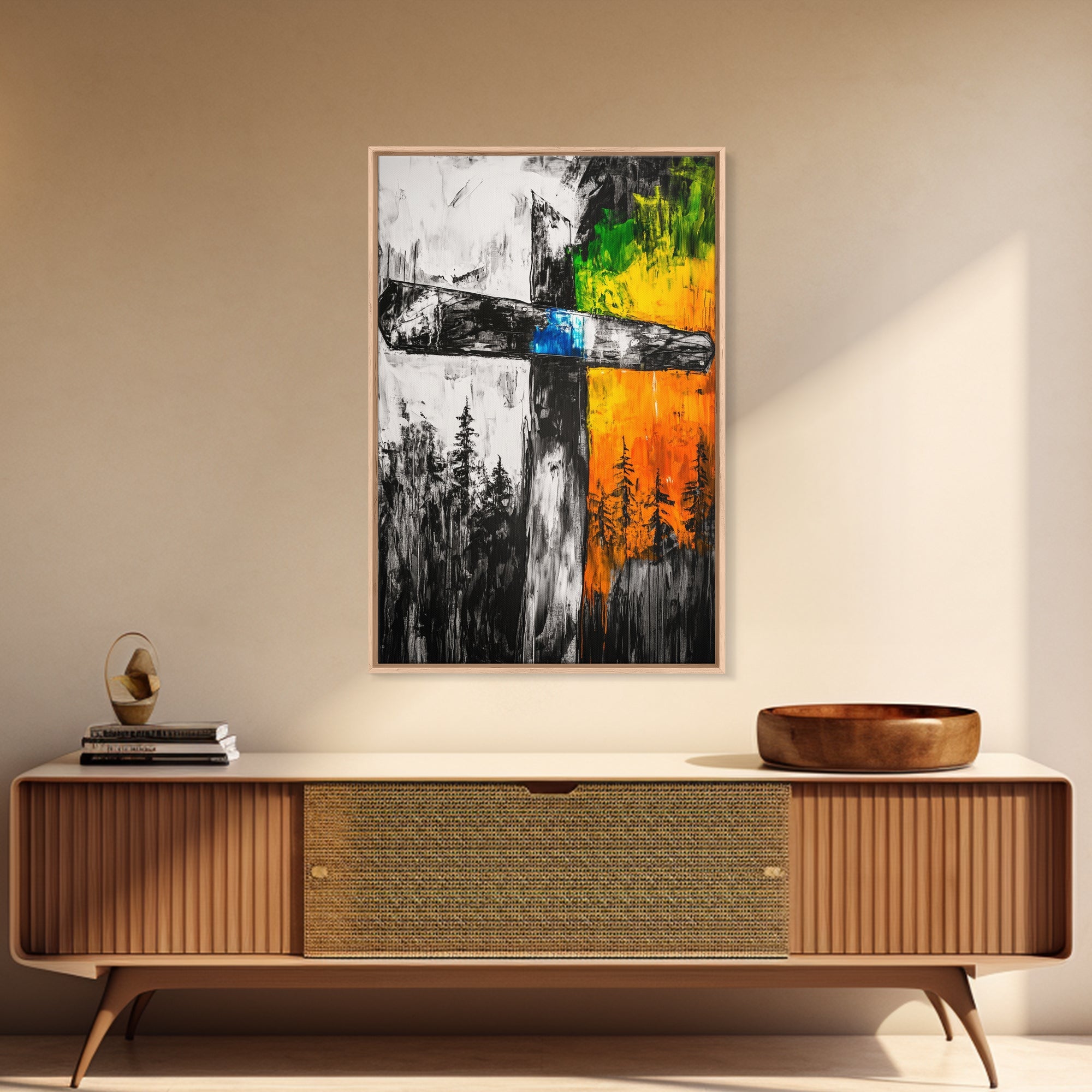 Framed canvas wall art of a cross in black, white, orange, green, and blue