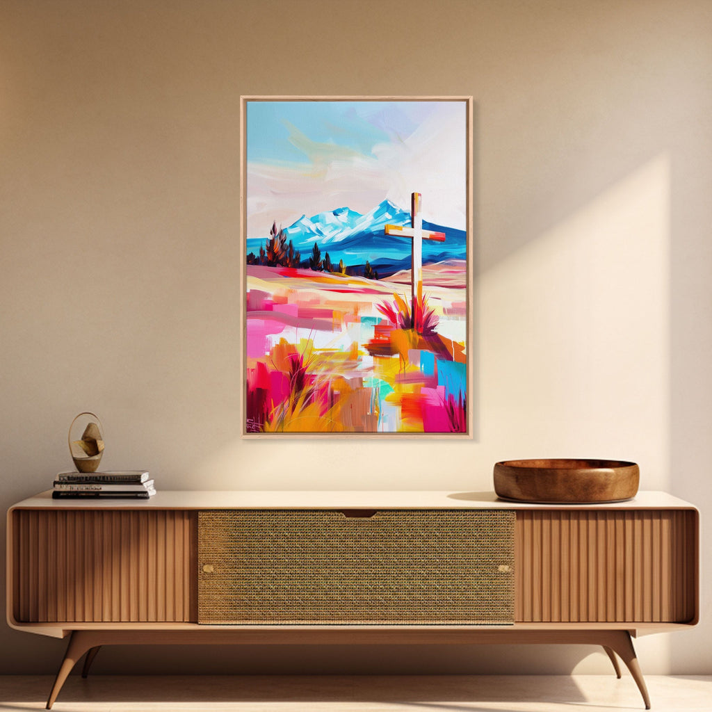 Framed canvas wall art with cross over colorful mountain landscape
