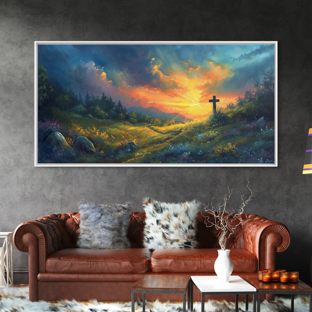 Framed canvas wall art showing a landscape sunset with a cross on the hill.