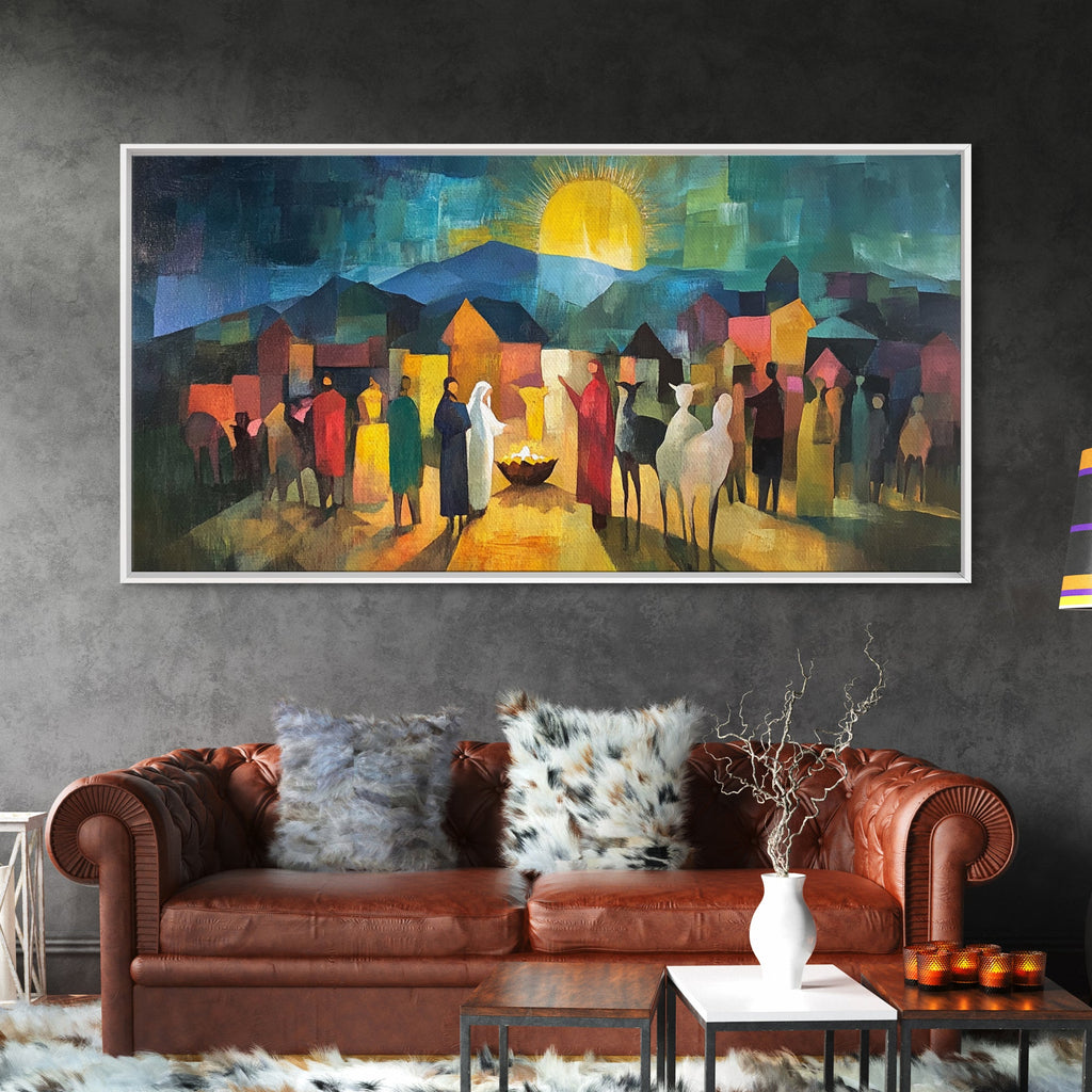 Framed nativity scene art print with crowd of figures, glowing sun, and warm central light