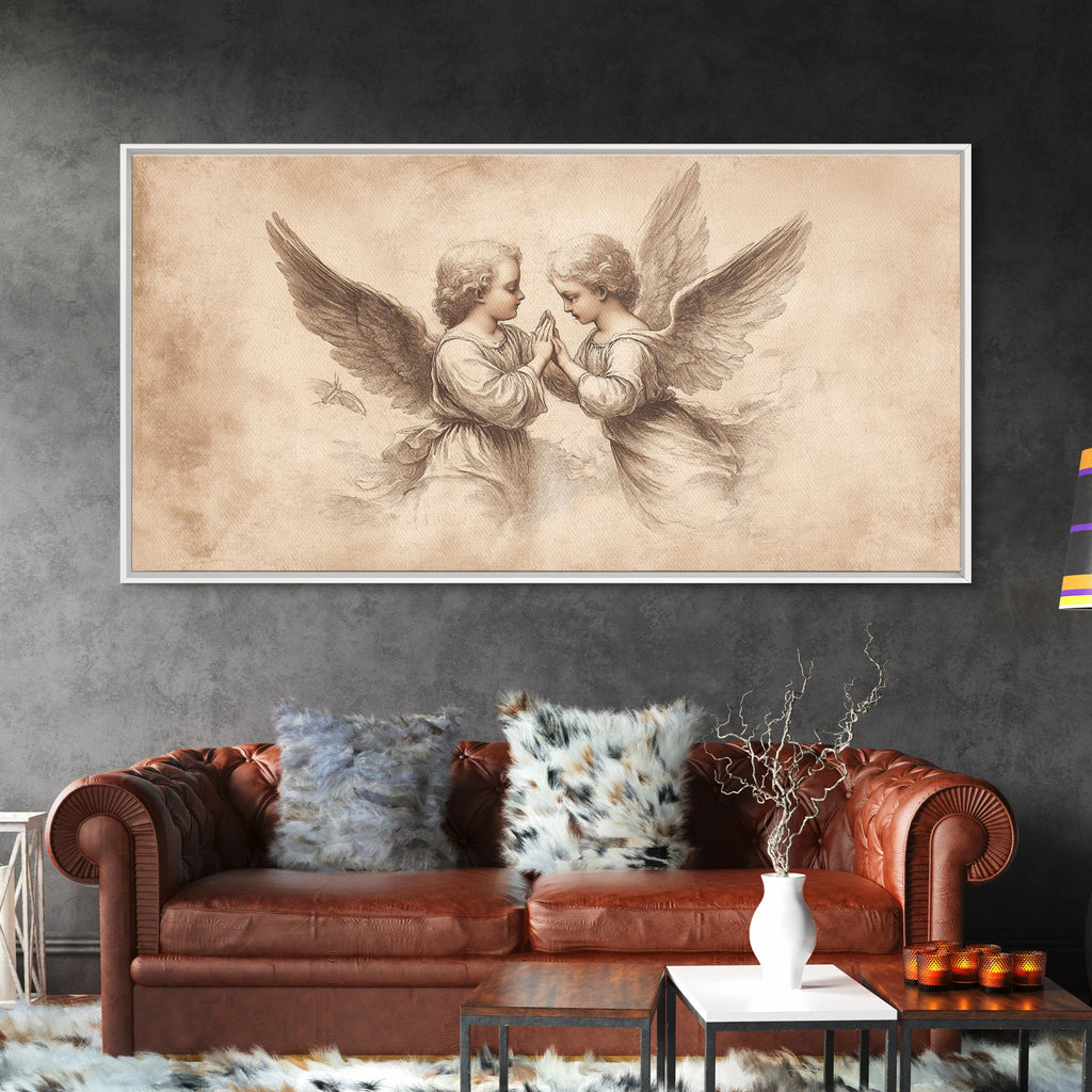 Framed angel wall art canvas print showing two cherubs with wings, in dark frame