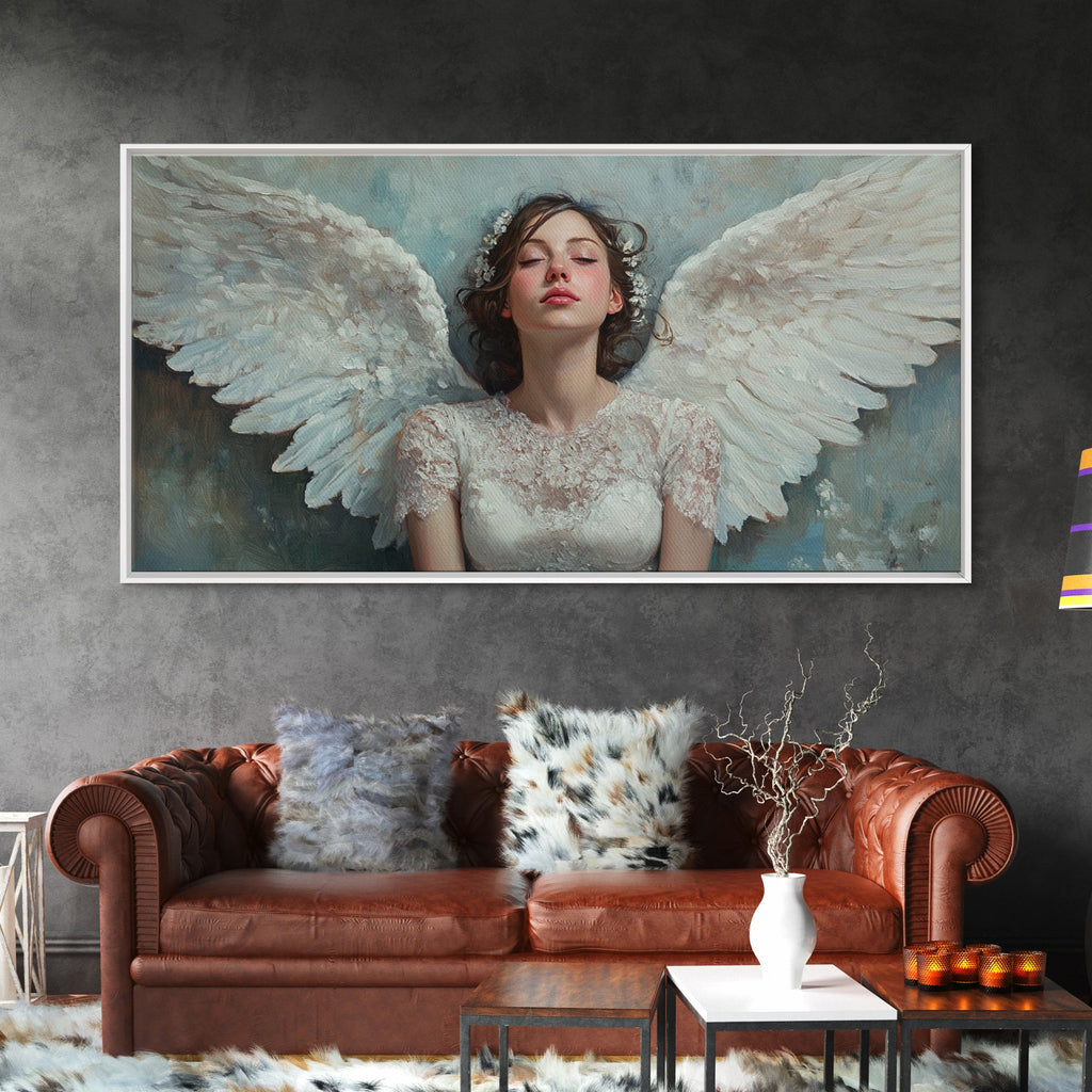 Framed angel canvas print with pale blue background and white wings, white frame