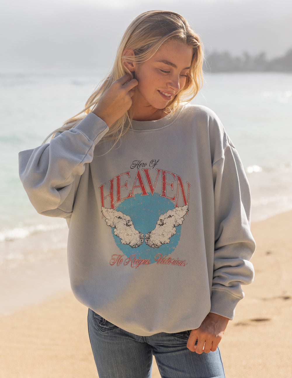 Unisex crewneck sweatshirt, light gray, front graphic with red lettering and blue map center
