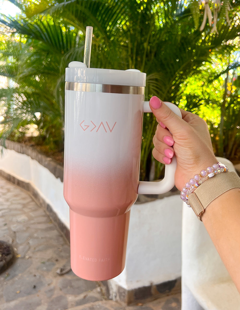 Insulated tumbler, pink ombre base, white body with GAV logo, silver lid, straw