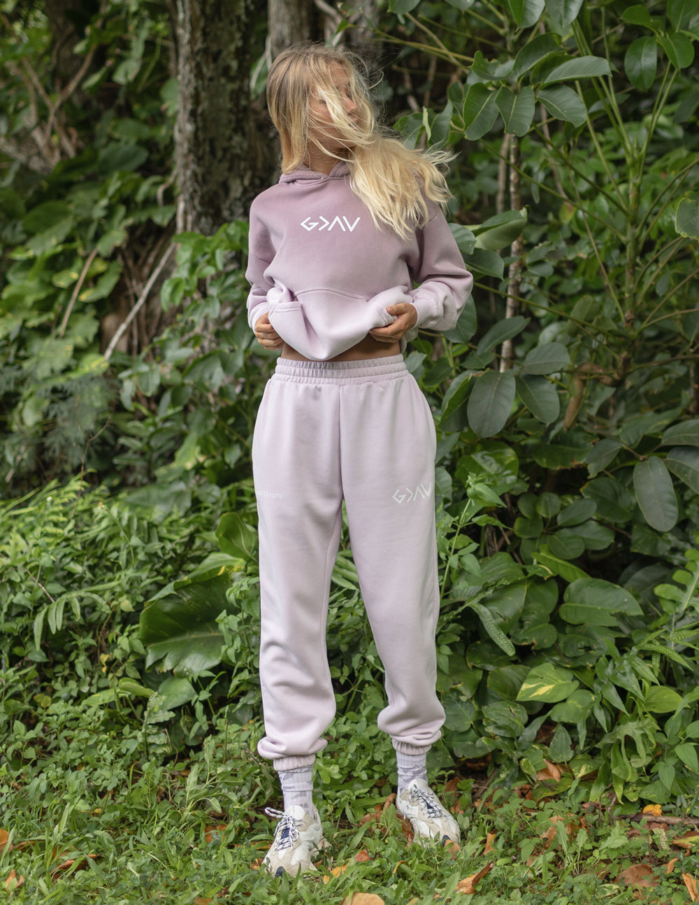 Light purple unisex sweatpants with drawstring waist and thigh logo