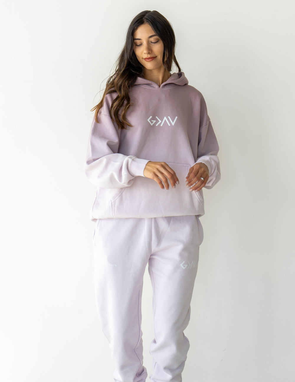Light purple unisex sweatpants with elastic waistband and leg logo