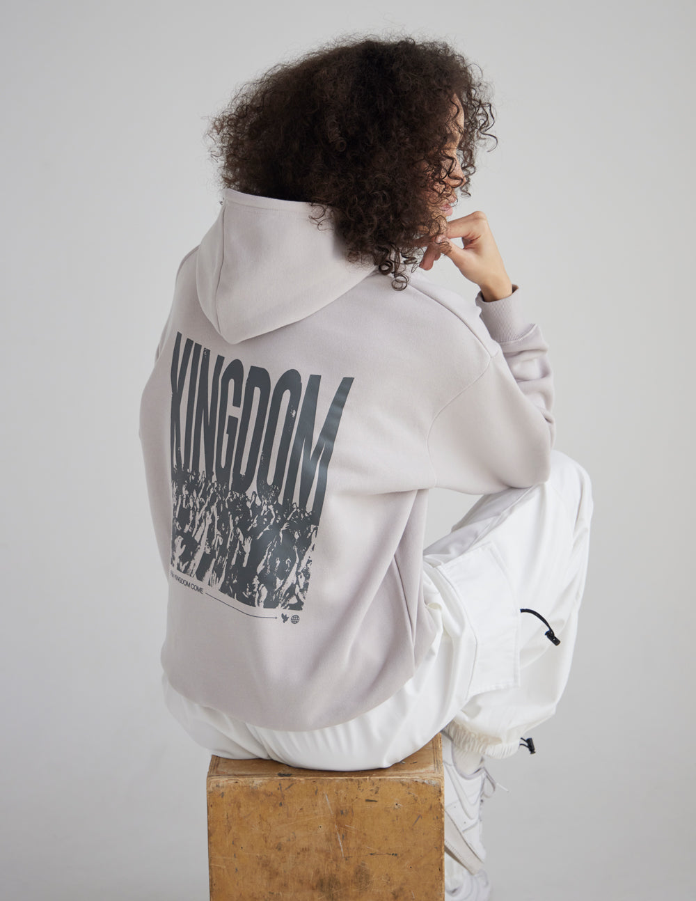 Light gray unisex hoodie, back view with KINGDOM graphic and kangaroo pocket