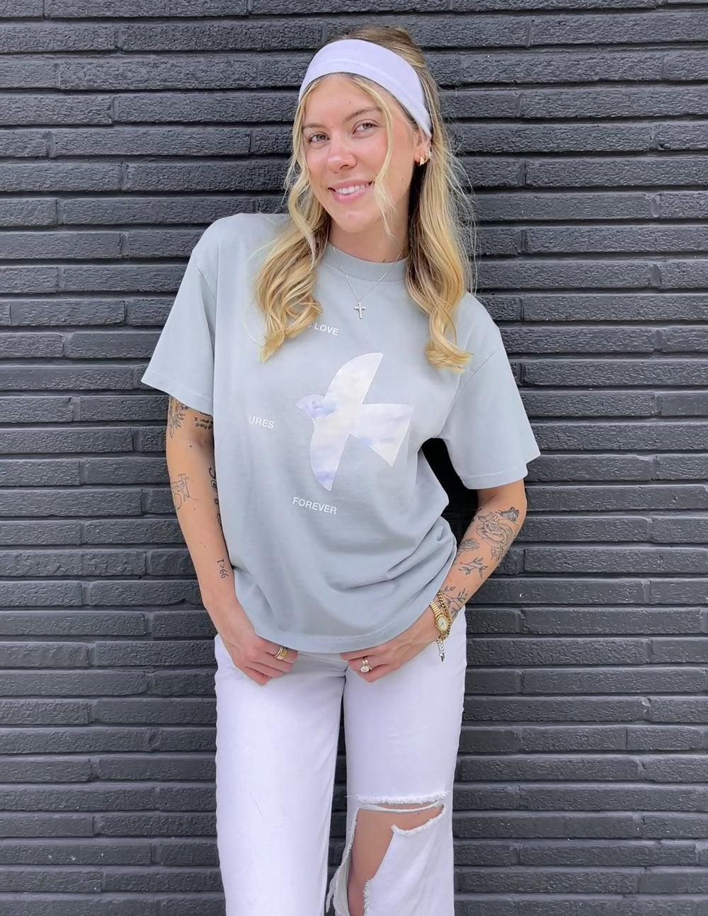Light blue heavyweight T-shirt with white dove graphic and text print