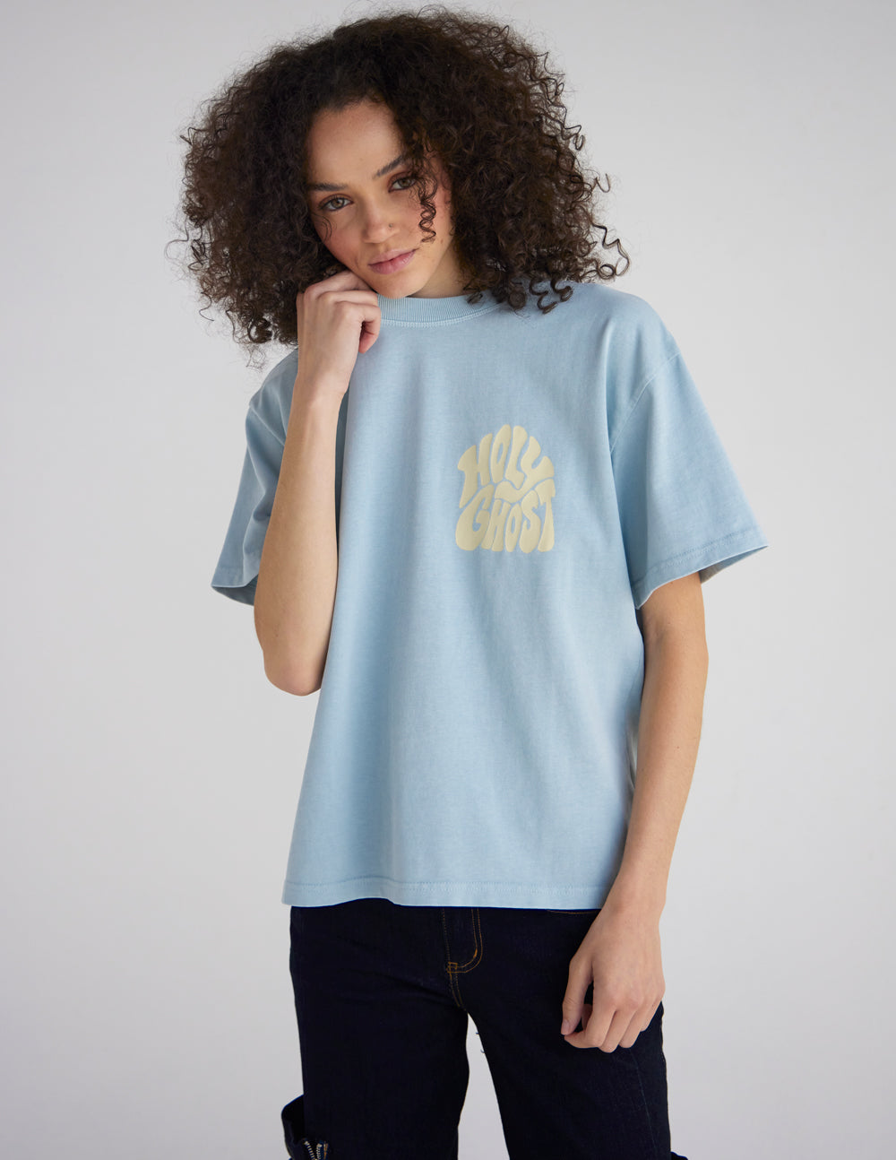 Light blue heavyweight T-shirt with front chest graphic and crew neck, short sleeves.