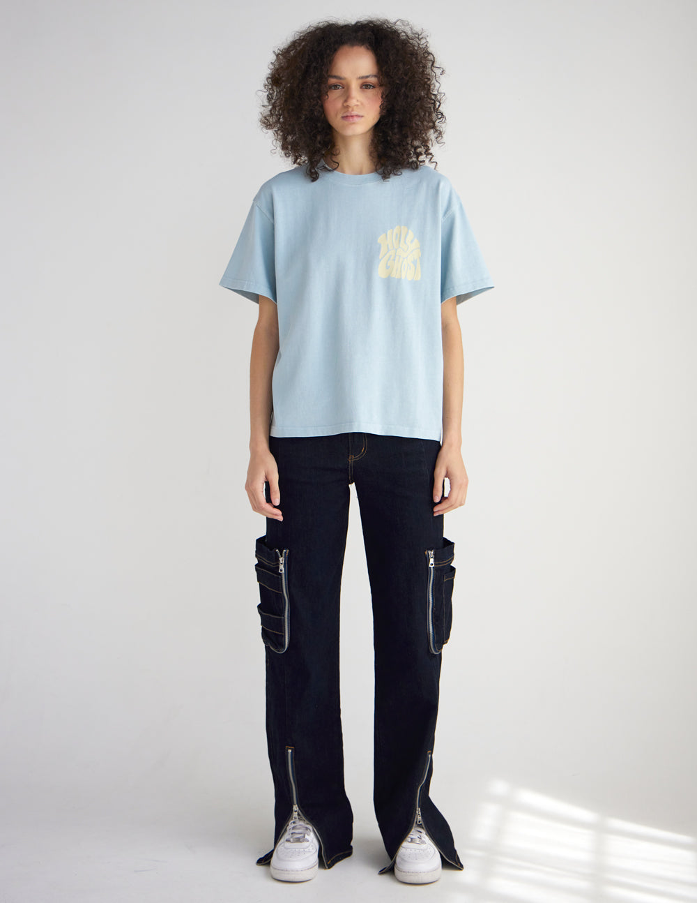 Light blue heavyweight T-shirt with front chest logo graphic, crew neck, short sleeves.
