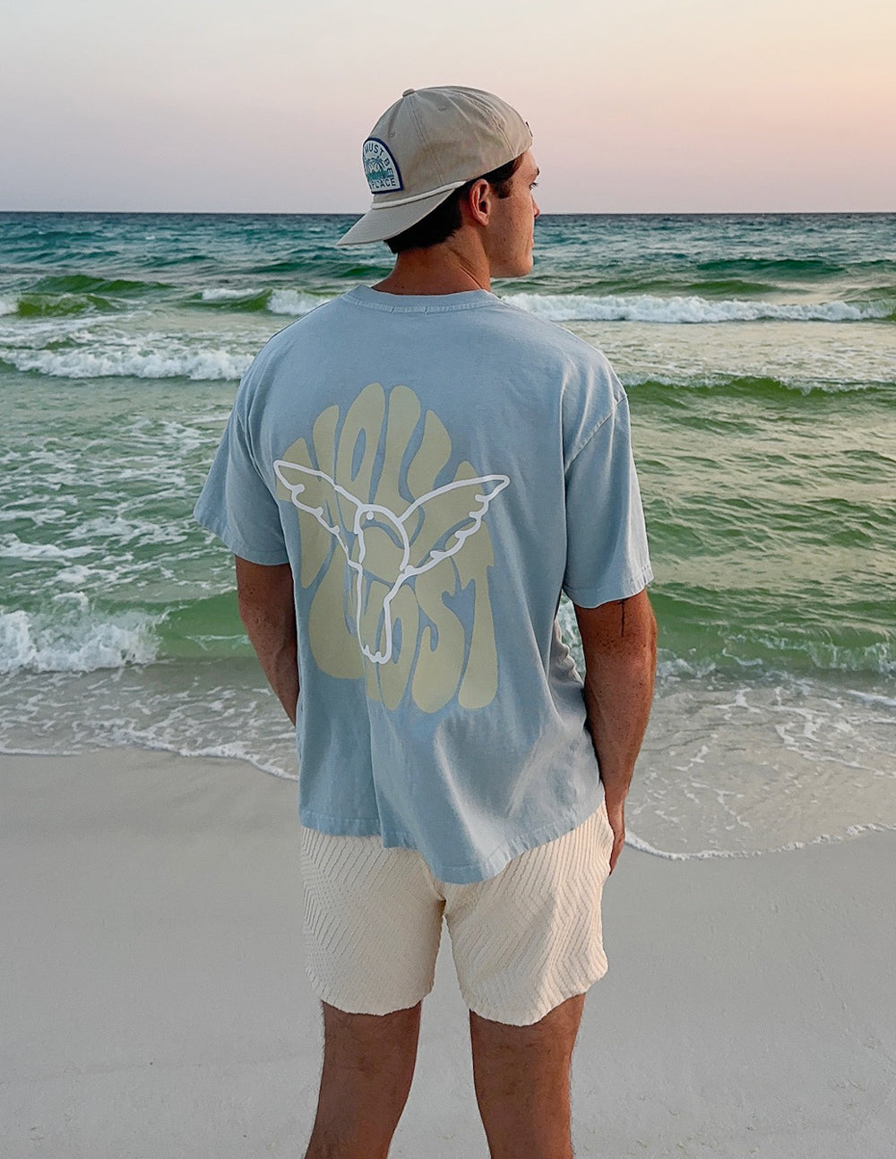 Light blue heavyweight T-shirt with large back graphic print, crew neck, short sleeves.