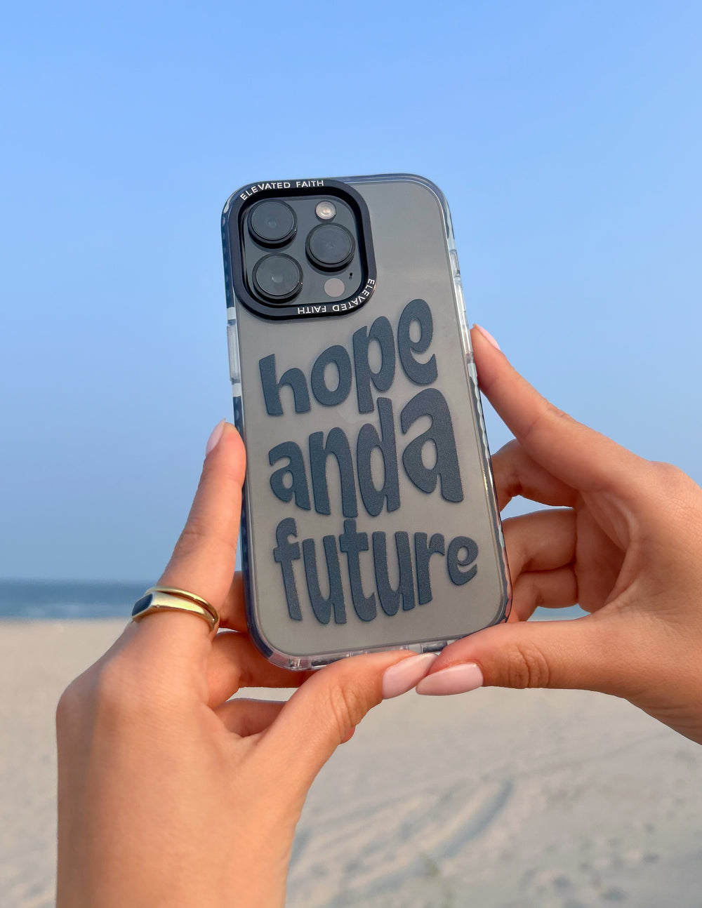 Clear phone case with blue hope and a future text and camera cutouts