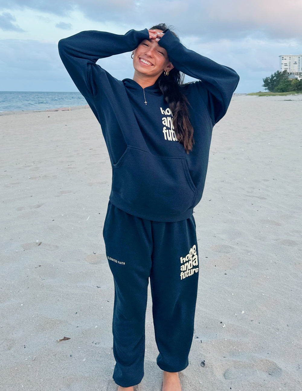Unisex navy sweatpants with “Hope and a Future” logo print on the thigh