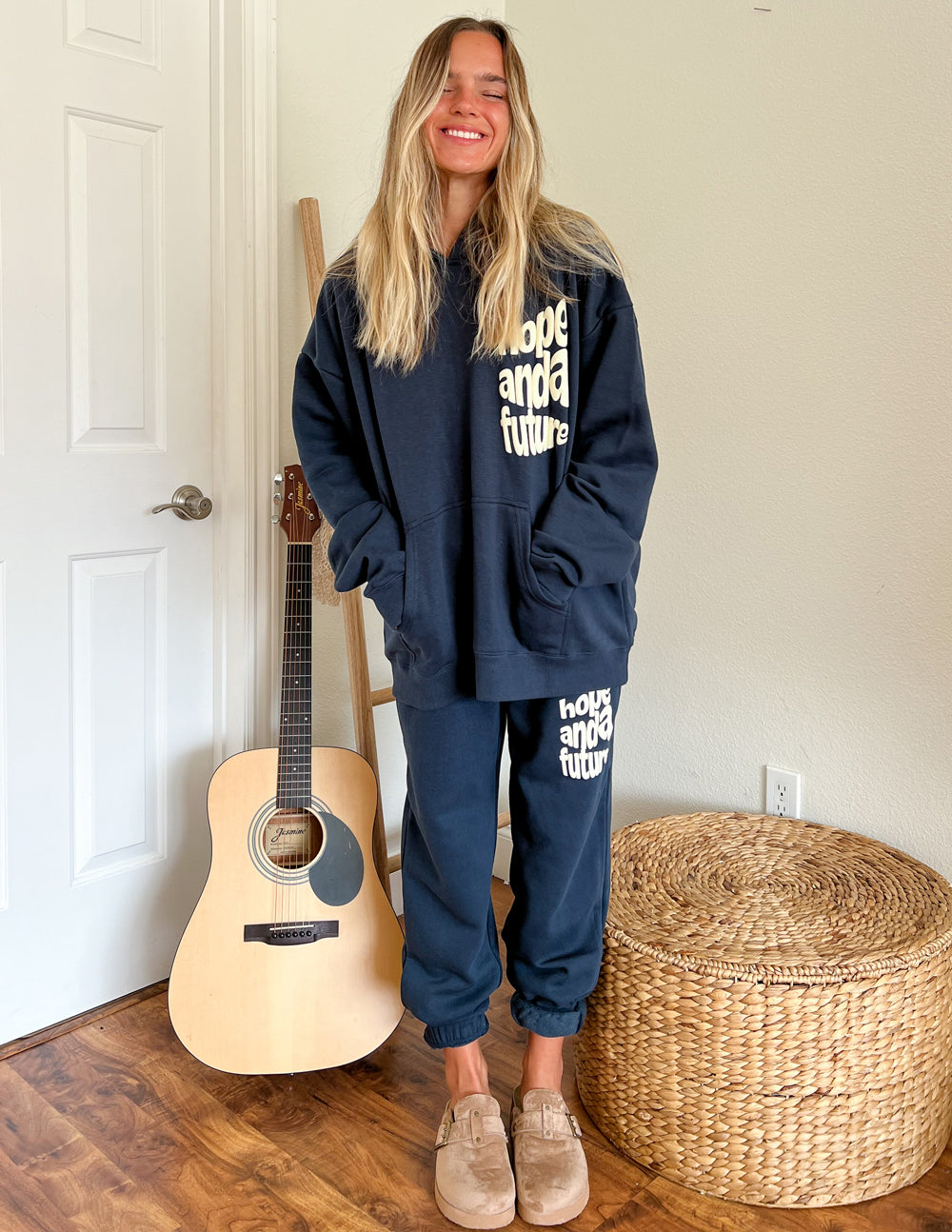 Unisex navy sweatpants with “Hope and a Future” logo on the front leg