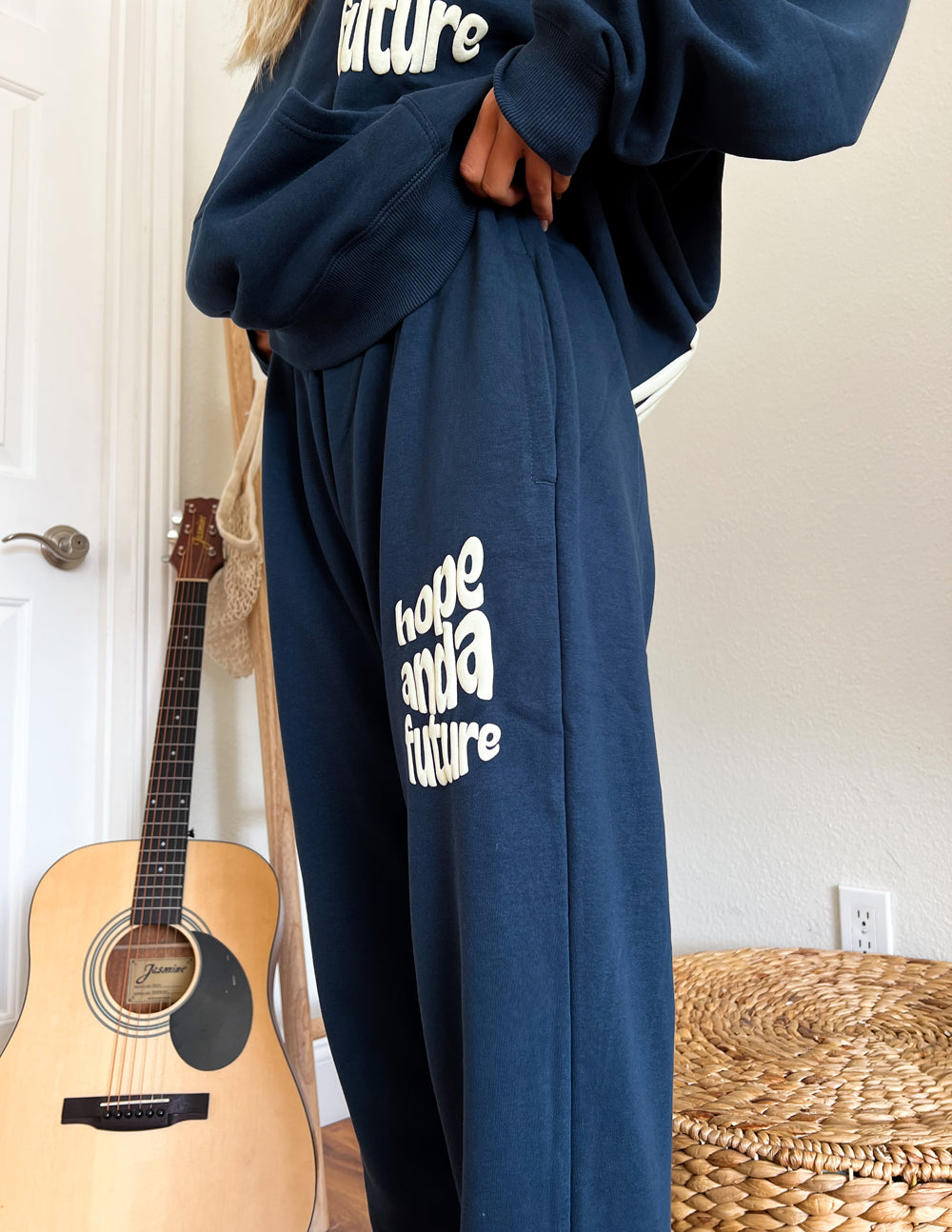 Unisex navy sweatpants with “Hope and a Future” logo print on the back leg