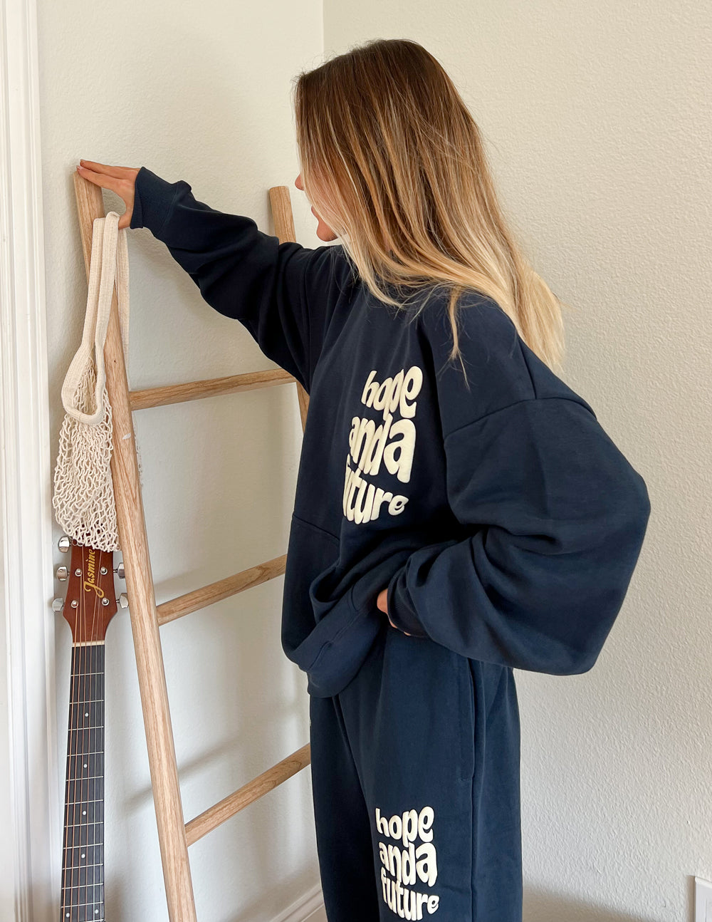 Unisex navy sweatpants with “Hope and a Future” logo print on the back