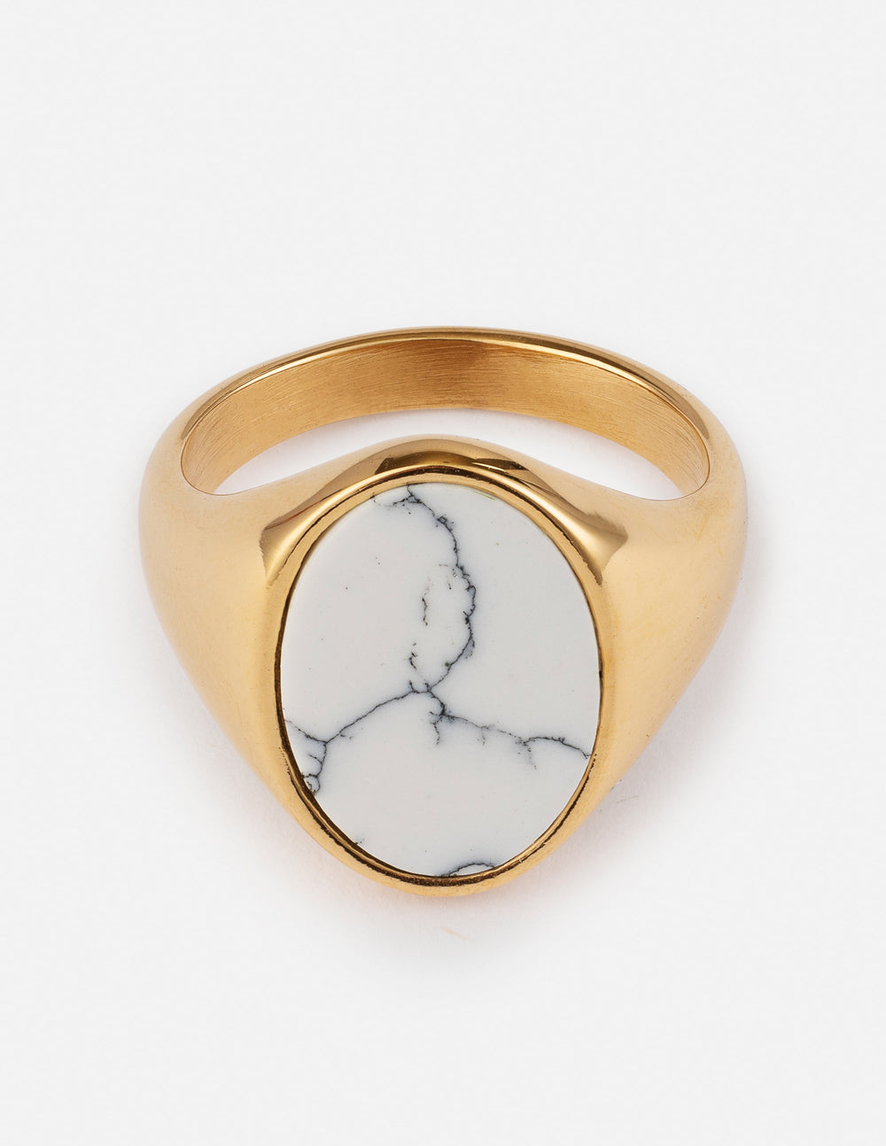Gold howlite stone ring with oval white center and black veining