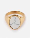 Gold howlite stone ring with oval white center and black veining