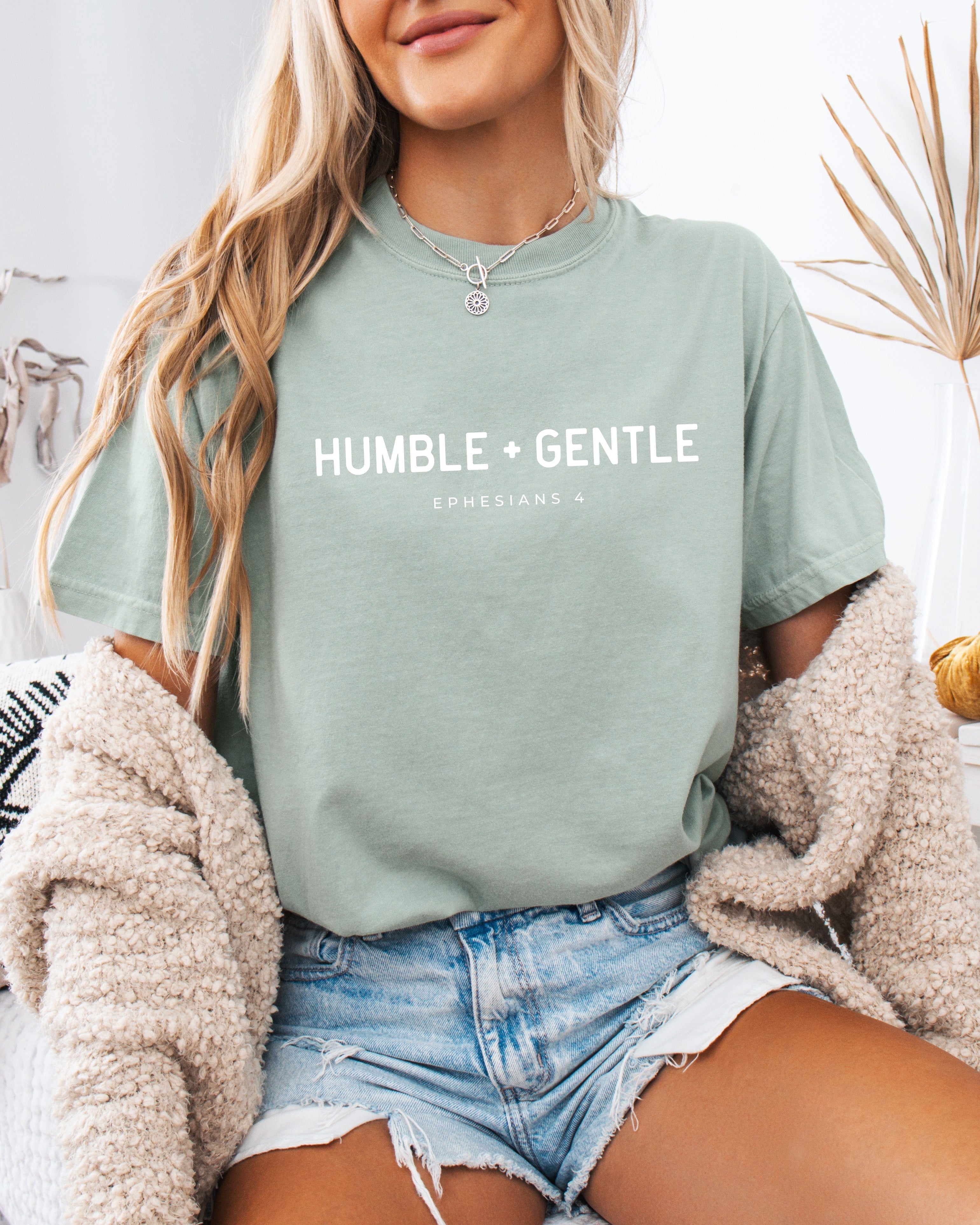 Garment-dyed unisex t-shirt, sage green, crew neck, “Humble + Gentle” front print