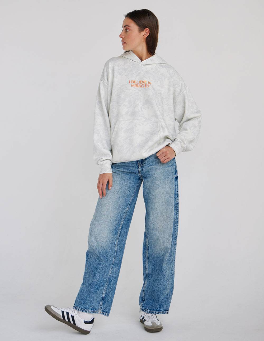 Light camo unisex hoodie with small orange back logo and kangaroo pocket