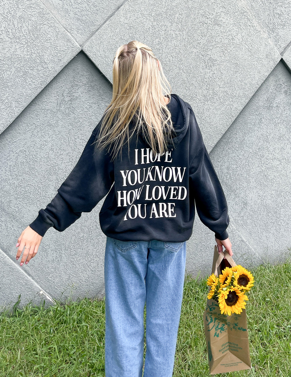 Dark unisex hoodie with large back graphic print and front kangaroo pocket