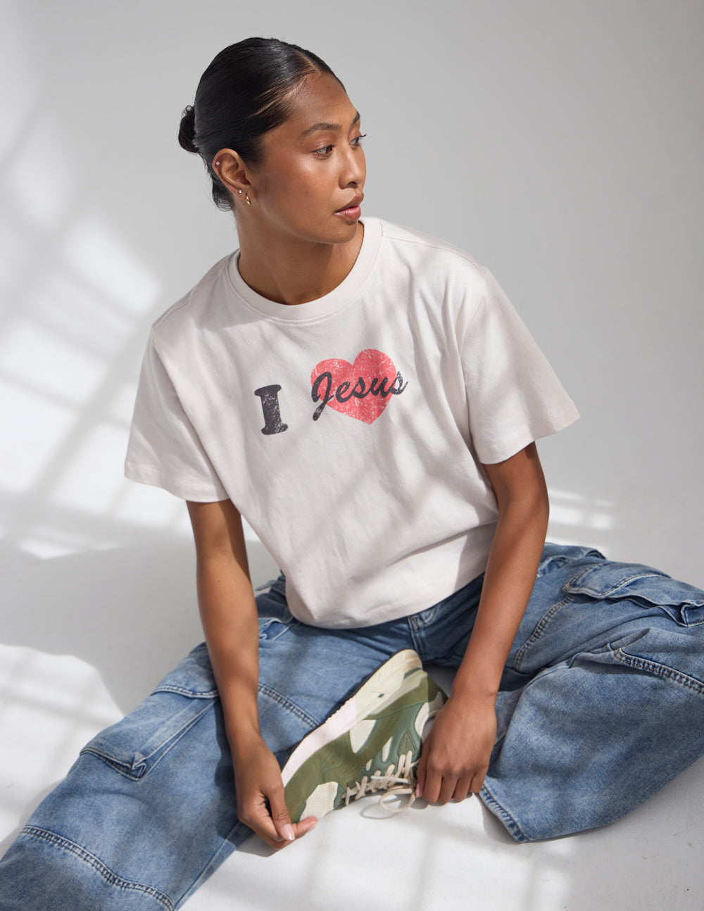 Cropped white women's tee with 'I Jesus' heart graphic on the front