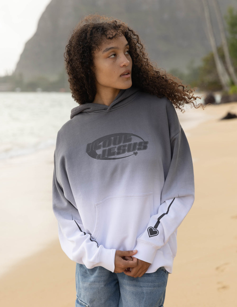Unisex gray pullover hoodie with large 'I Love Jesus' logo on back
